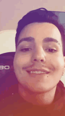 a close up of a man 's face with the number 30 visible in the corner