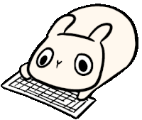 a cartoon bunny is laying on a keyboard .