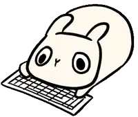 a cartoon bunny is laying on a keyboard .