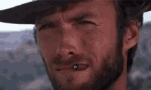 Clint Eastwood Watch GIF - Clint Eastwood Watch Cigar GIFs