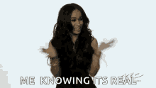 a woman is dancing in front of a white background and saying `` me knowing its real '' .