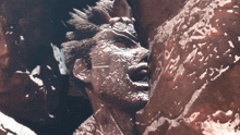 a close up of a person 's face with a lot of white spots