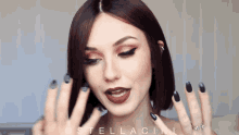Stella Cini Long Nails GIF - Stella Cini Long Nails Black Nails GIFs