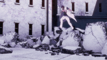 a man in a white coat is standing on a pile of rocks in front of a building
