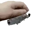 a close up of a person 's hand holding a small object on a white background .