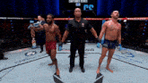 a referee stands between two fighters in a boxing ring with a sign that says contender series