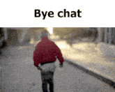 a blurred image of a person walking down a street with the words bye chat above them