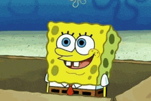 spongebob squarepants is smiling and looking at the camera while standing on a beach .