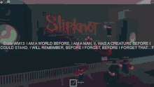 a group of people standing in front of a slipknot logo