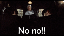 a nun is standing in a dark room with the words no no behind her