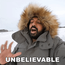 a man wearing a parka with a fur hood says " unbelievable "