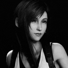 a black and white photo of a woman 's face