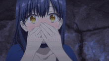 a girl with blue hair and yellow eyes covering her mouth with her hands