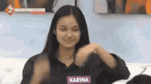 Karina Bautista Smiles GIF - Karina Bautista Smiles Raised Eyebrow GIFs