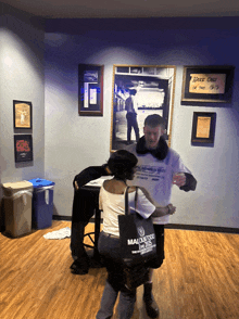a man and a woman are dancing in a room with a sign on the wall that says jazz club of the 90 's