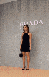 Emma Watson Prada GIF - Emma Watson Prada Black Mini Dress GIFs