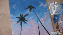 a person is painting palm trees on a canvas made by animatica