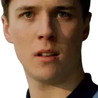 a close up of a young man 's face with a surprised look on his face