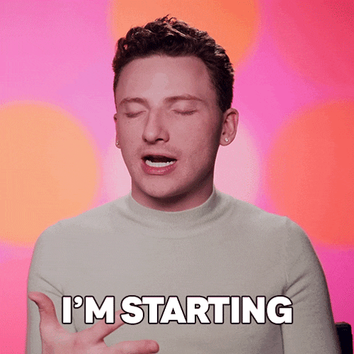 a man with his eyes closed says i 'm starting in front of a pink background