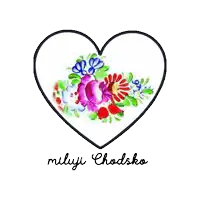 a heart with flowers painted inside of it and the words miluji chodsko below it