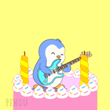 a birthday cake with a penguin playing a guitar