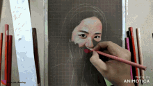 a drawing of a woman 's face is being made by animatica