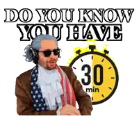 a man wearing headphones and sunglasses stands in front of a 30 minute timer