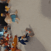 a blurred image of a person playing with toys