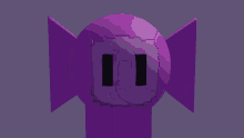 a close up of a purple object with two black holes in it 's eyes .