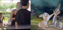 a man and a woman are standing next to each other next to a cartoon bunny rabbit .