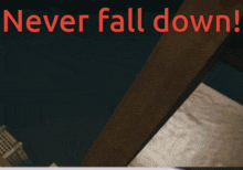 a sign that says " never fall down " on it