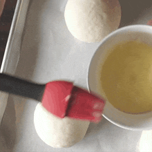 Brushing Egg Wash Two Plaid Aprons GIF