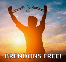 a silhouette of a man breaking a chain with the words brendons free below him