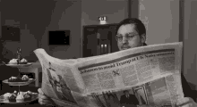 Reading The Paper Newspaper GIF - Reading The Paper Newspaper Relaxing GIFs