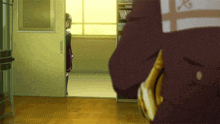 a man in a suit holds a saxophone while a girl stands in a doorway