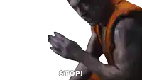 a man in a karate uniform says stop
