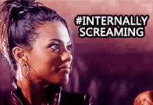 a woman in a ponytail is screaming with the words `` internally screaming '' above her .