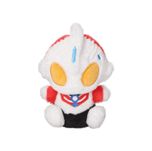 a stuffed animal with a red and white helmet