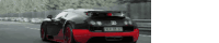 a bugatti veyron is driving down a road