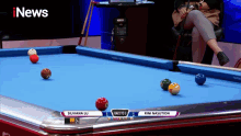 silviana lu is playing pool against rini nasution in the race to 3