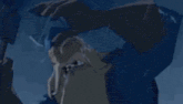 a close up of a cartoon character 's face in a dark room .