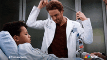 Treating A Patient Dr Will Halstead GIF - Treating A Patient Dr Will Halstead Nick Gehlfuss GIFs