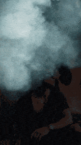 a man with smoke coming out of his head