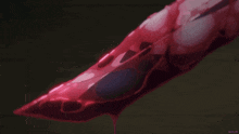 a close up of a red liquid with a watermark that says mix.tv on the bottom