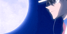 a man is standing in front of a full moon .