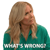 a blonde woman in a green shirt says what 's wrong