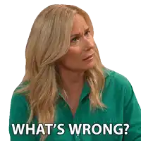 a blonde woman in a green shirt says what 's wrong