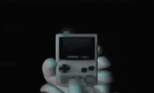 a game boy with a picture of a boy and the words game boy horror on it