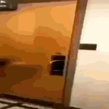 a close up of a door with a key on it