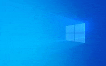 a blue background with a windows logo in the middle of it .